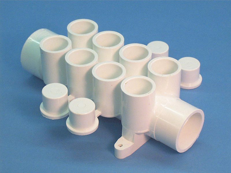 672-4640 - Manifold PVC,Water,WATERW,1.5 Inch S x 1.5 Inch Spg x (8)3/4 Inch S(4)Plgs - 672-4640